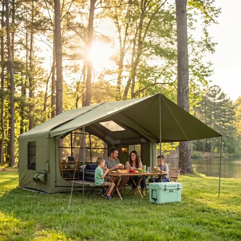 Senleeto olive green inflatable cabin tent with a family dining under the awning at a lakeside forest campsite