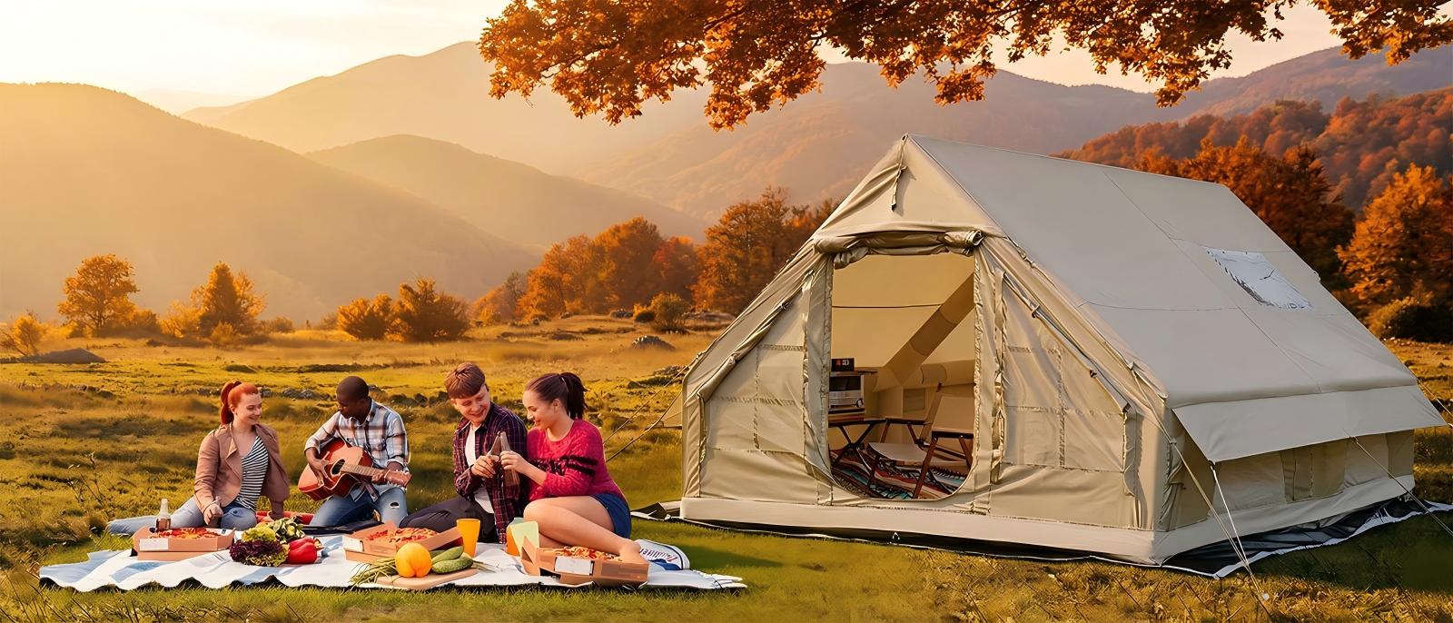 Senleeto inflatable camping tent set up in autumn meadow with family picnic