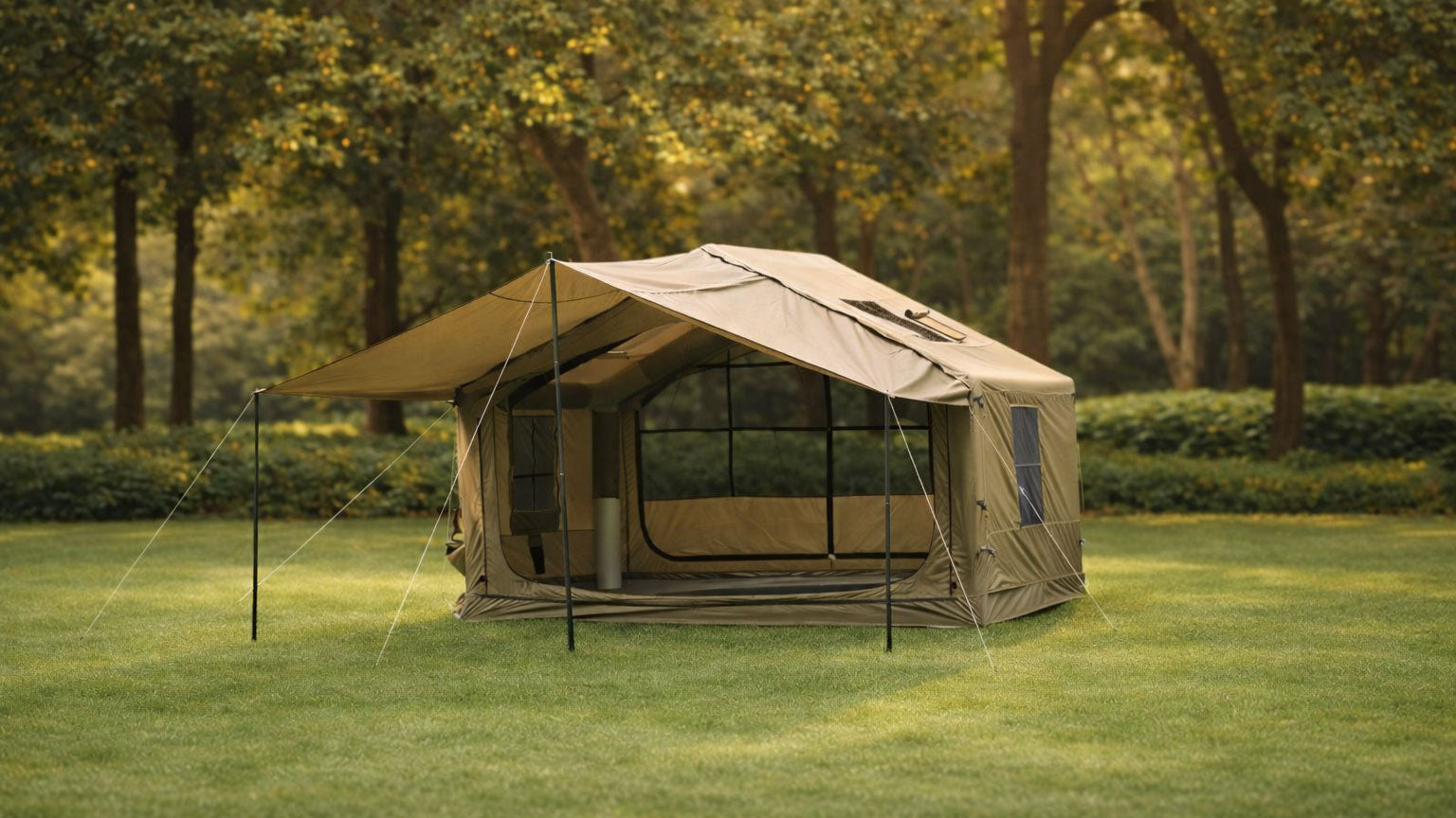Senleeto inflatable tent fully set up on grass with attached awning canopy extended, surrounded by green trees