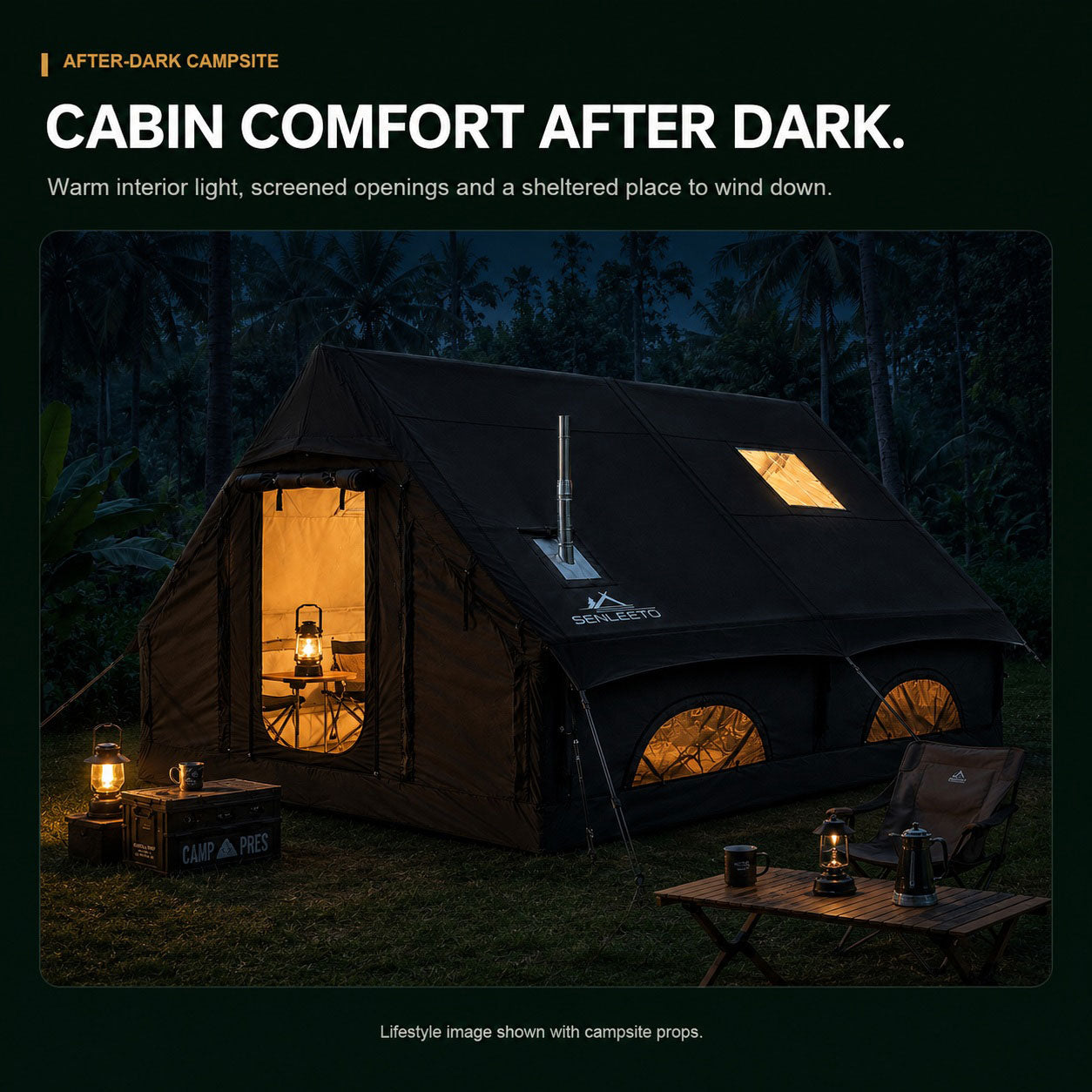 Senleeto black inflatable cabin tent illuminated at a nighttime campsite