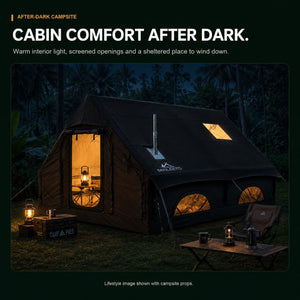 Senleeto black inflatable cabin tent illuminated at a nighttime campsite