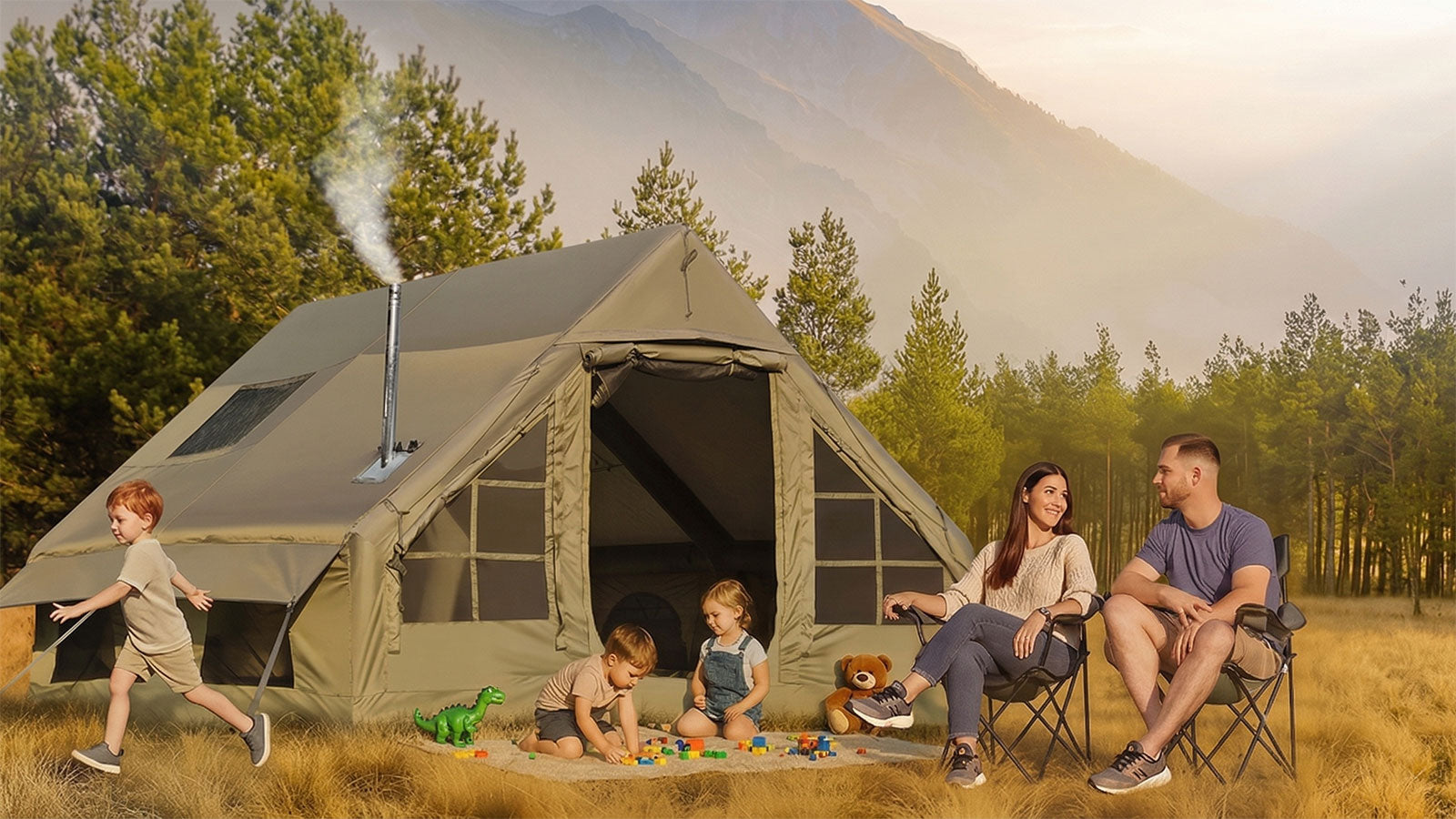 Family relaxing outside a large 4-season inflatable glamping tent with a wood stove chimney in the mountains.