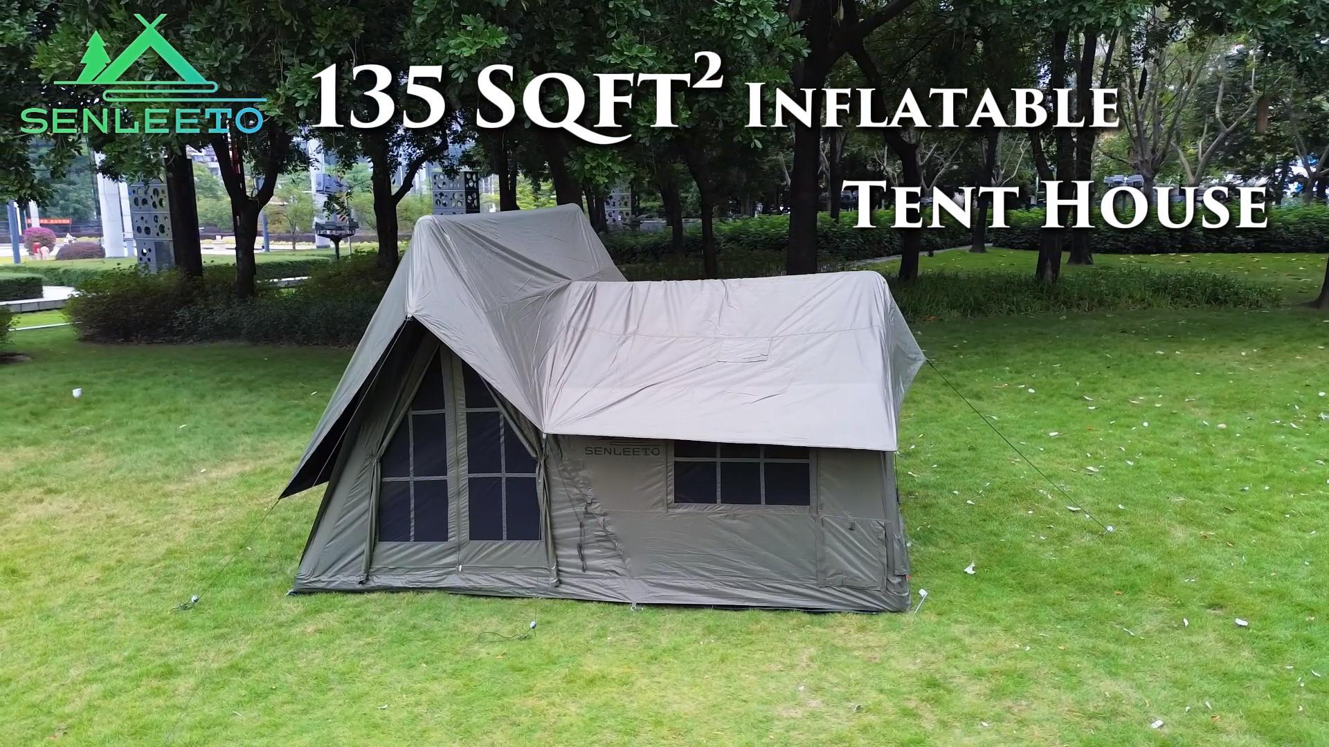 Senleeto 129 square feet large inflatable cabin tent pitched on grass. Quick setup waterproof glamping tent.