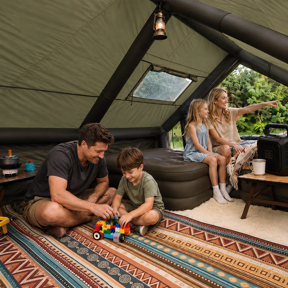 Family playing and relaxing inside the green Cabin tent.