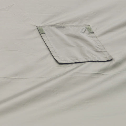 Fabric flap on the army green tent canopy.