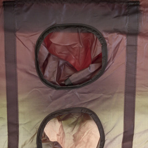 Air conditioner duct openings inside the army green tent.