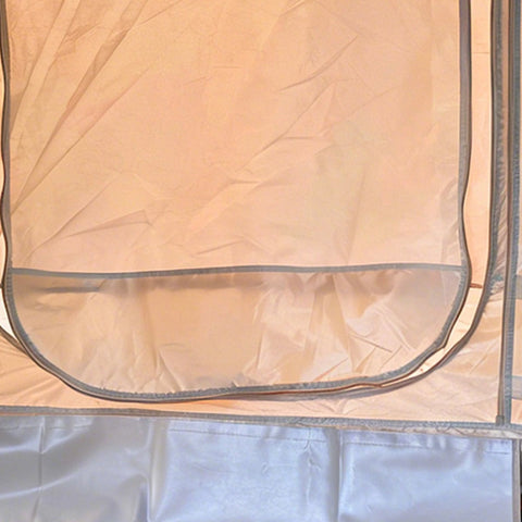 Zipped khaki fabric door panel on the Cabin tent
