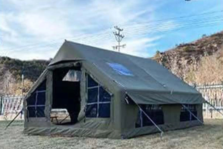 Small entrance and side view of an army green Cabin tent
