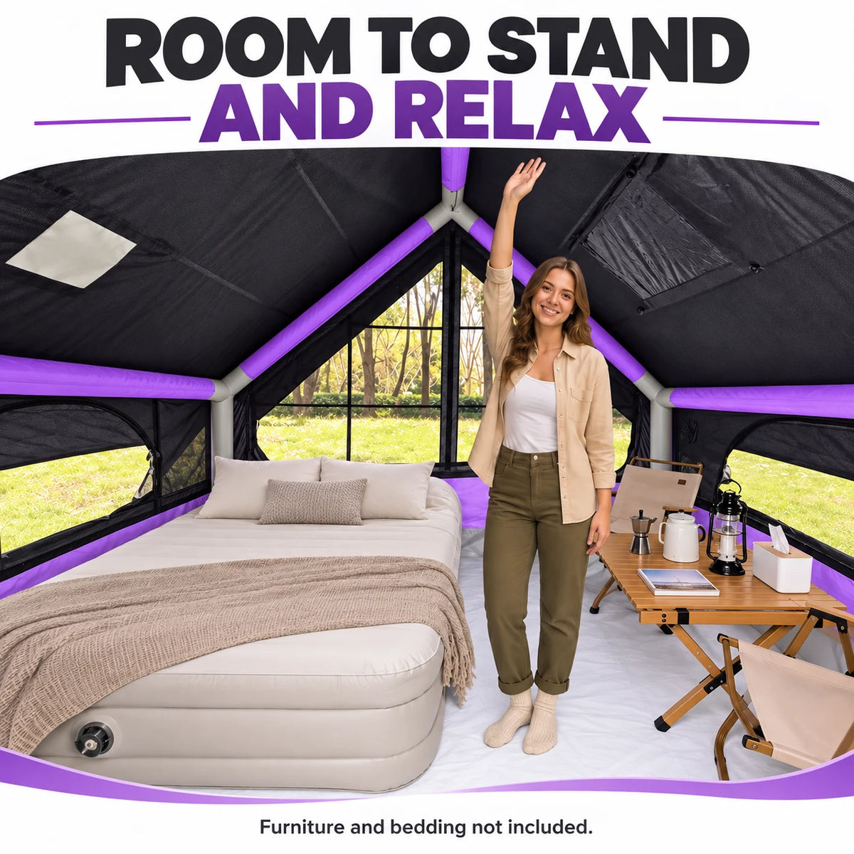A camper standing inside the purple blackout cabin tent beneath the peaked roof.