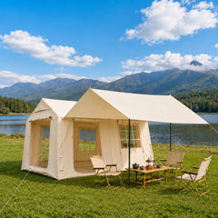 Senleeto inflatable glamping tent with canopy setup by a scenic mountain lake.