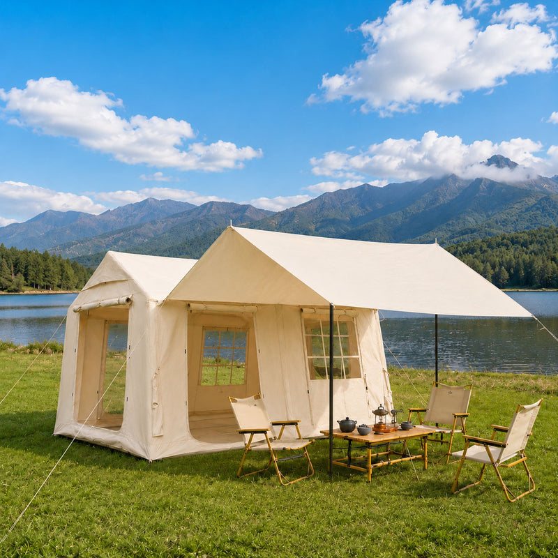 Senleeto inflatable glamping tent with canopy setup by a scenic mountain lake.