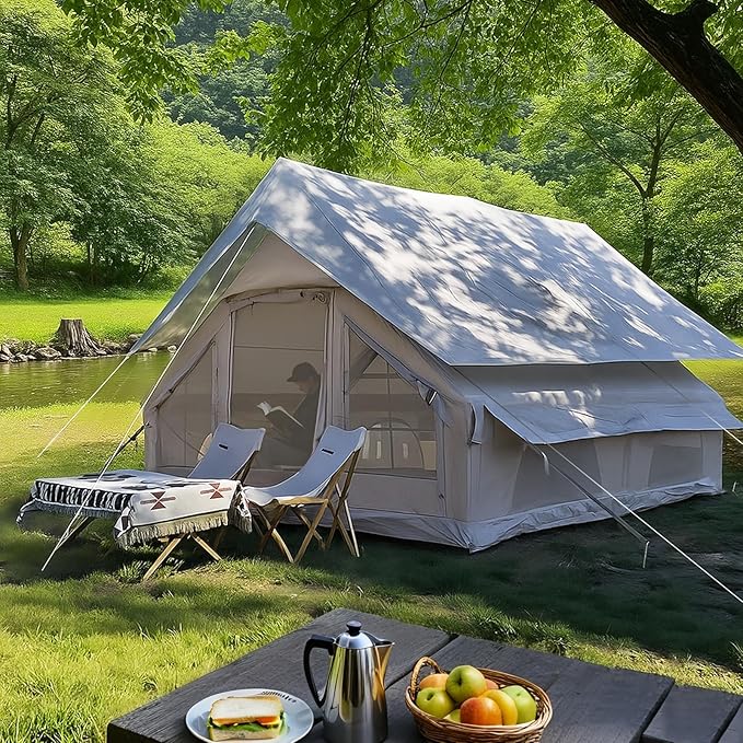 Senleeto beige inflatable glamping tent set up outdoors. Luxury waterproof family camping tent.