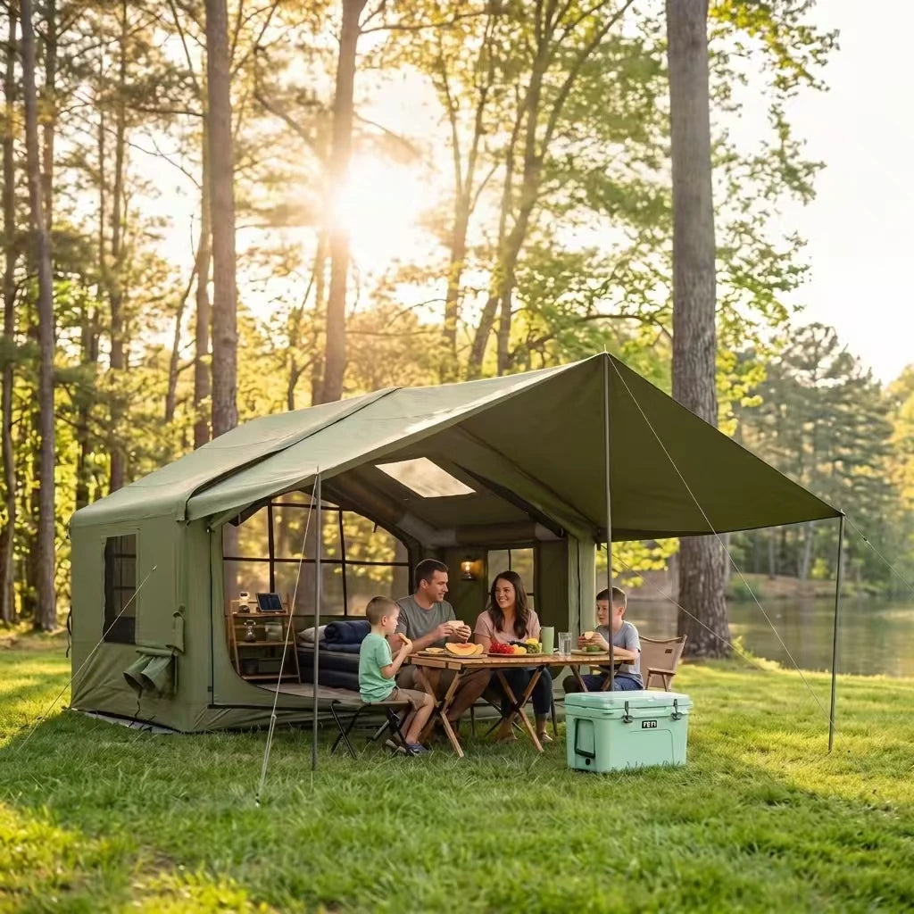 Senleeto olive green inflatable cabin tent with a family dining under the awning at a lakeside forest campsite