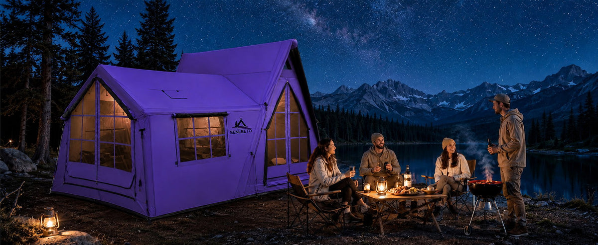 Purple A-Frame tent in a nighttime lakeside camp.