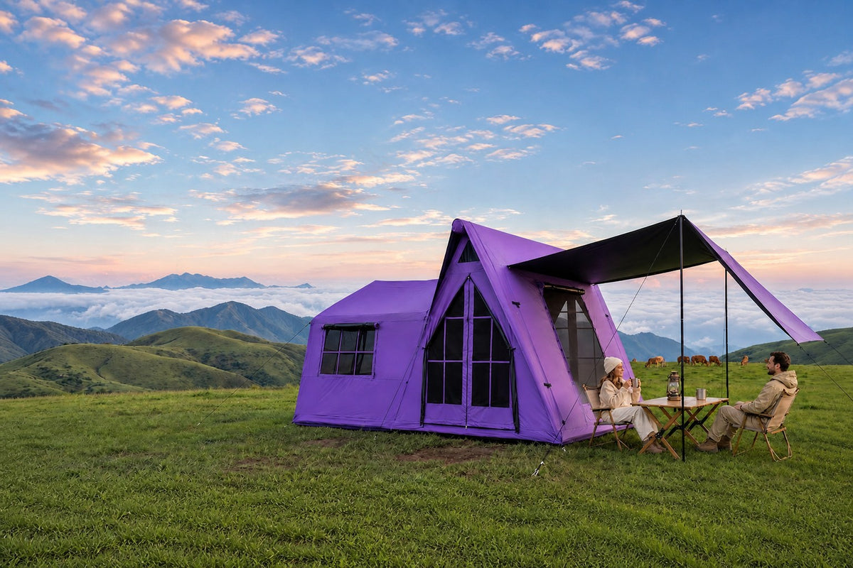 Purple Senleeto A-Frame inflatable tent with its detachable side awning attached on open grassland
